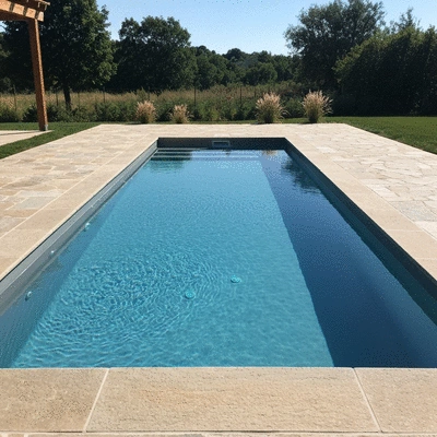 Modern pool with renovated coping and natural stone decking, clean lines, clear blue water, sunny day, no text, no words, no typography, no labels, clean image